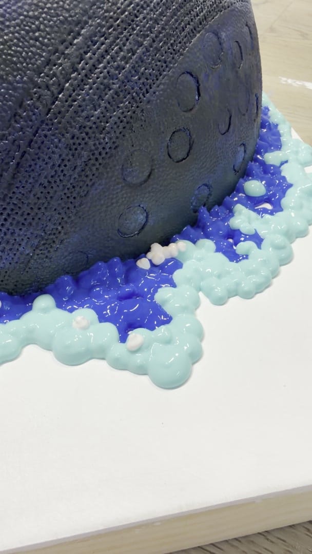 Studio process clip: macro of the dark encaustic dome edge of Eye Sea All I meeting its piped blue and turquoise reef