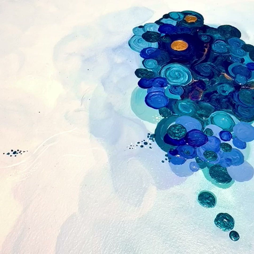 Cluster of cobalt circles with gold centers on the right, cyan wash and negative space on the left