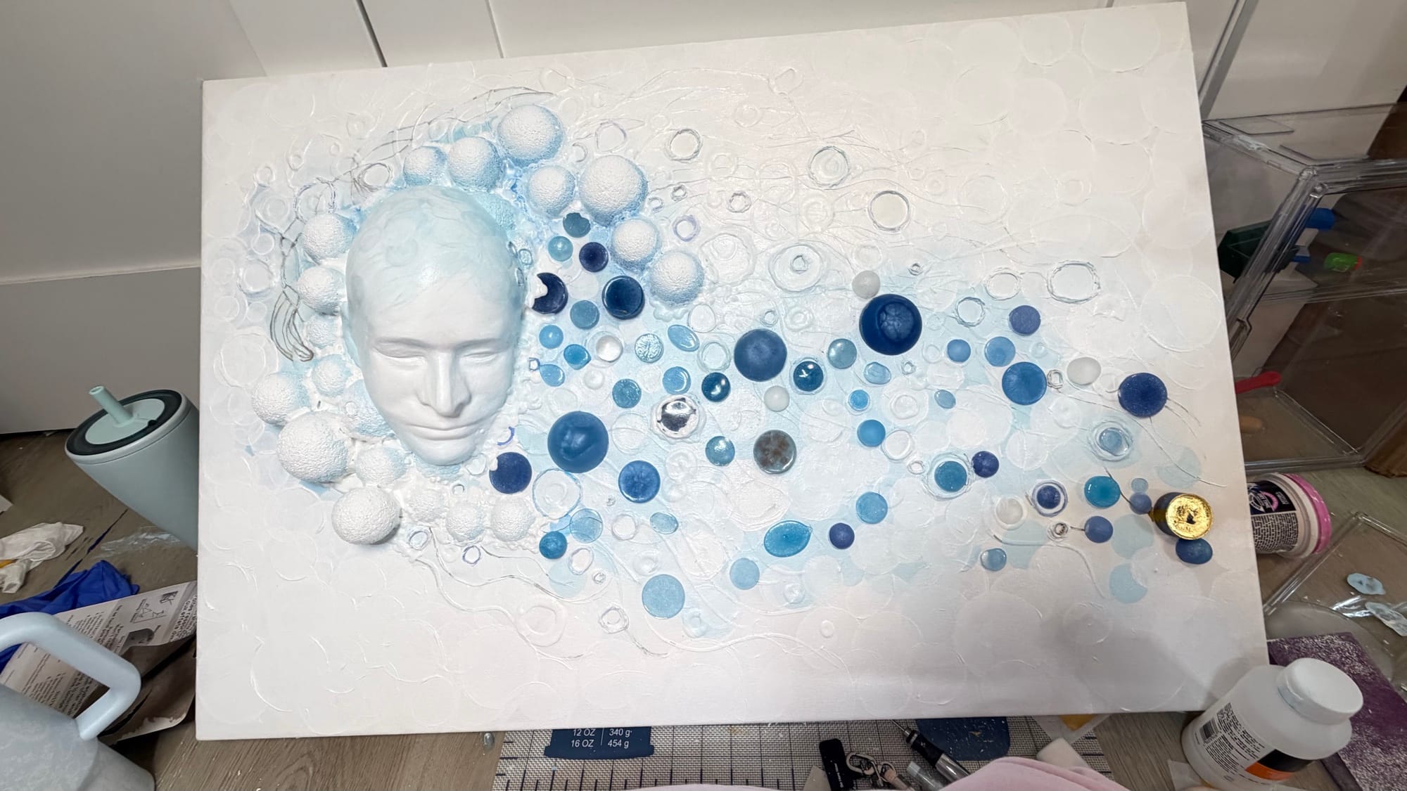 Ciguapa: full artwork studio view with dimensional head and cerulean cascade