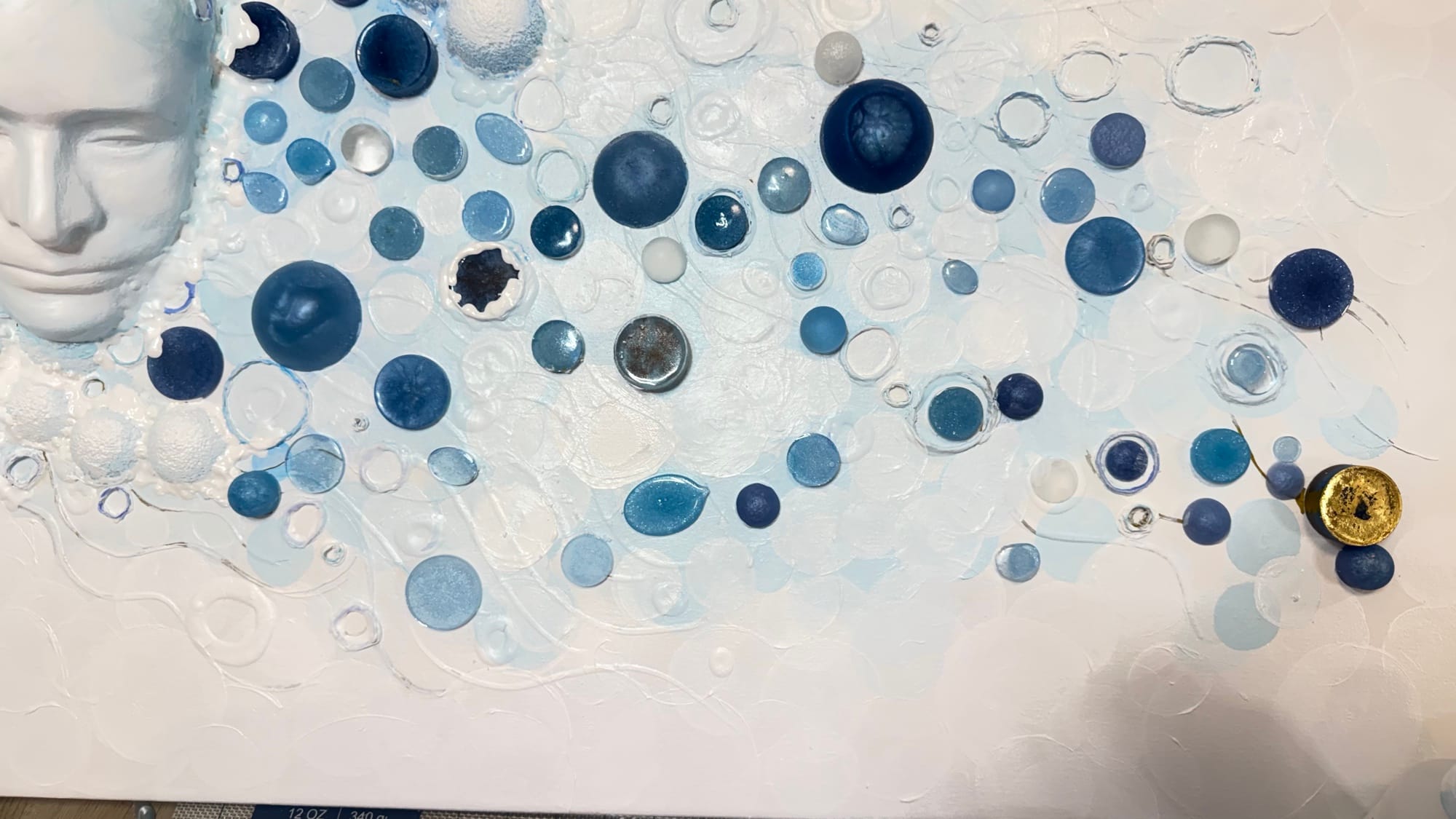 Ciguapa: surface detail of cerulean field and circular forms